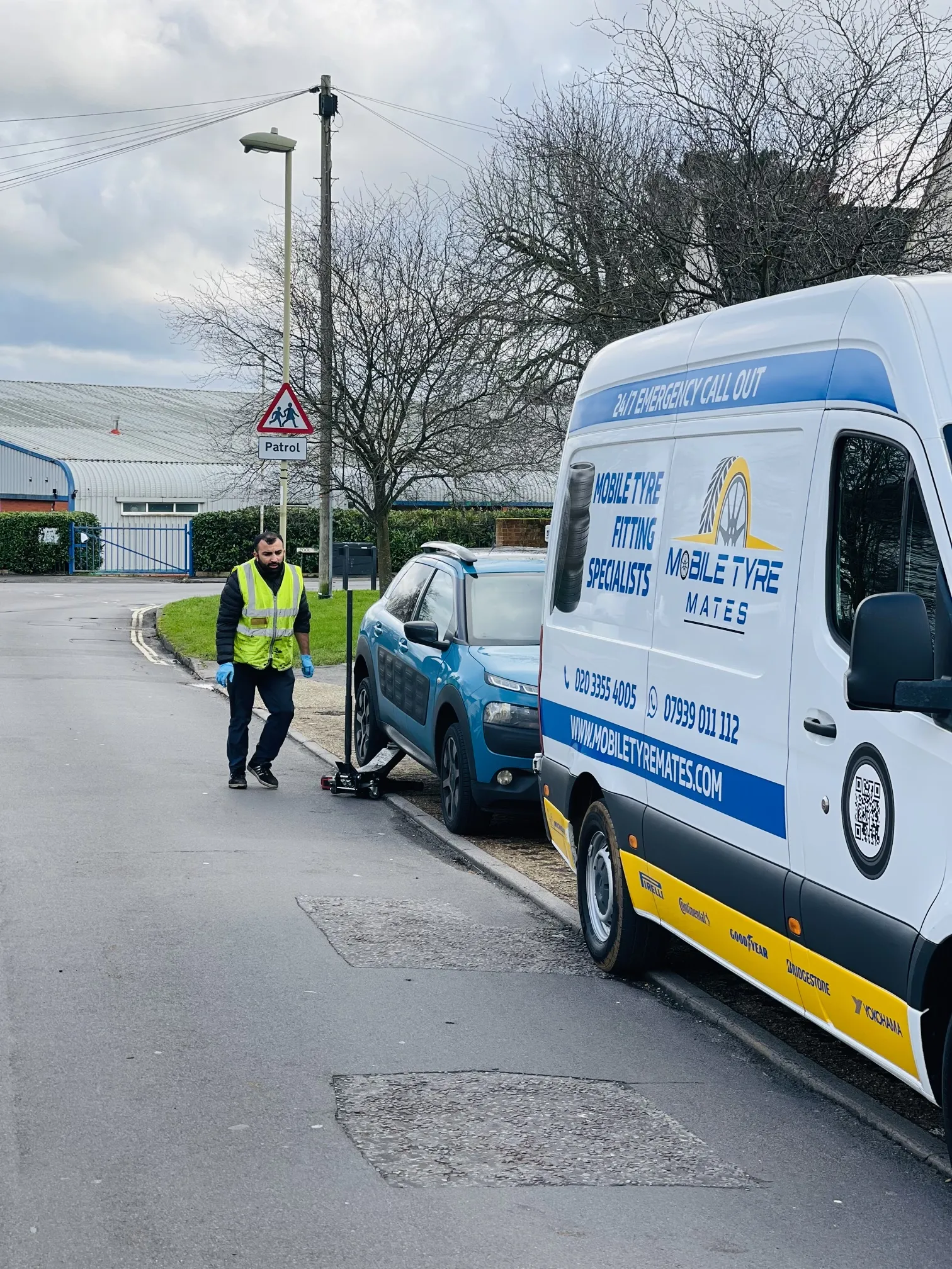 Technician balancing a wheel during a Basingstoke call out
